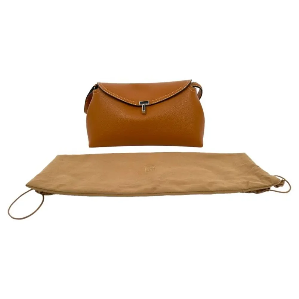 Totême T-Lock Grained-Leather Clutch in Tan Brown Leather
